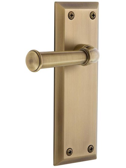 Grandeur Fifth-Avenue Door Set with Georgetown Levers in Antique Brass.